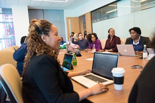 image group of adults in meeting room